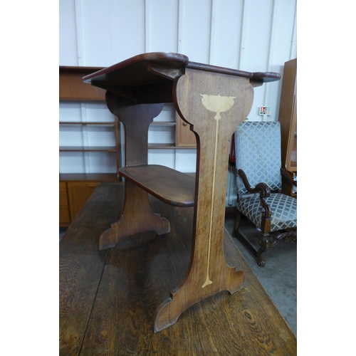 120 - An Arts and Crafts inlaid oak occasional table, attributed to Liberty & Co.