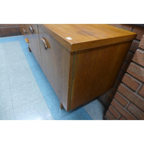 125 - A teak sideboard