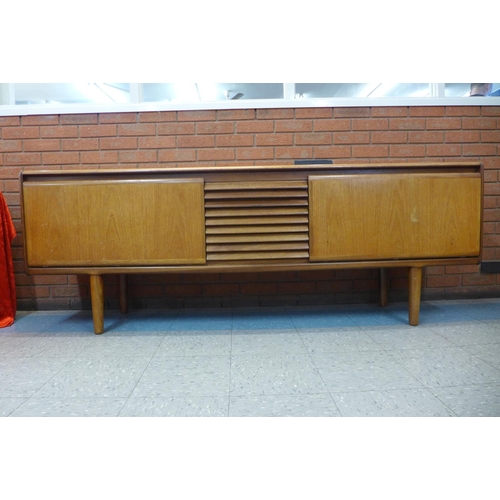 131 - A White & Newton teak sideboard