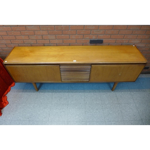 131 - A White & Newton teak sideboard