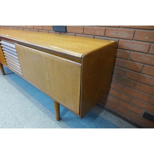 131 - A White & Newton teak sideboard