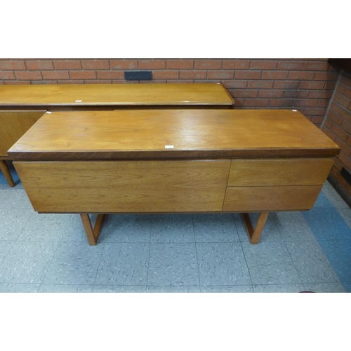 132 - A teak sideboard