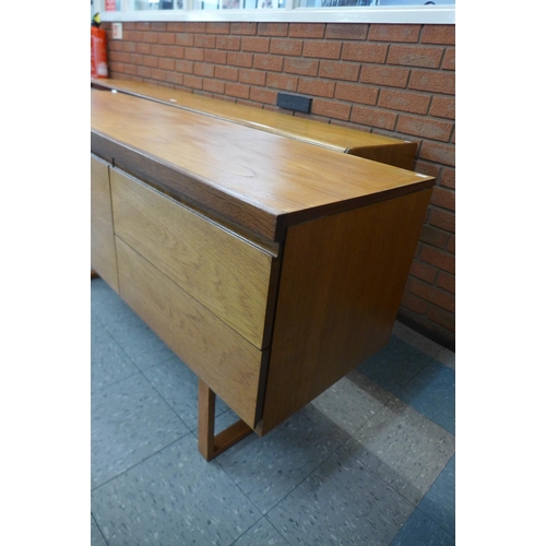 132 - A teak sideboard