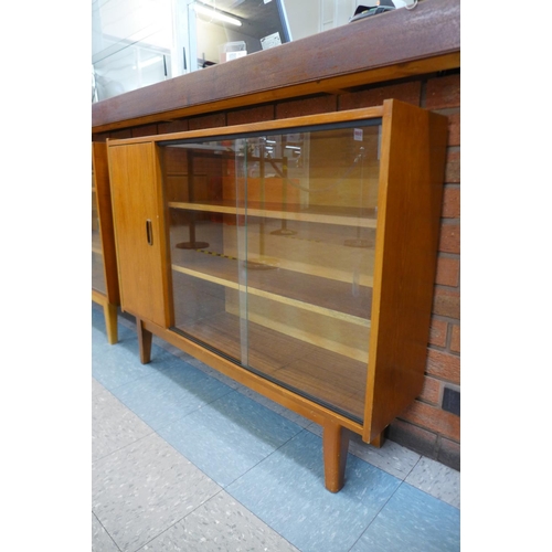 134 - A teak bookcase