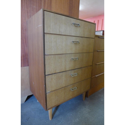 143 - A teak chest of drawers