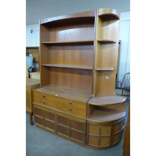 146 - A Nathan teak bookcase and matching corner cabinet