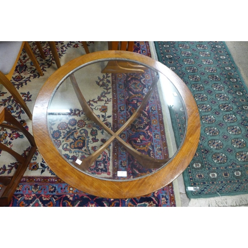 158 - A G-Plan Astro teak and glass topped circular coffee table