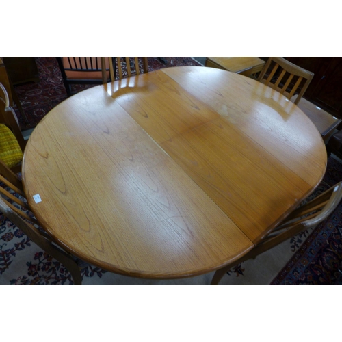 160 - A G-Plan Fresco teak extending dining table and six chairs