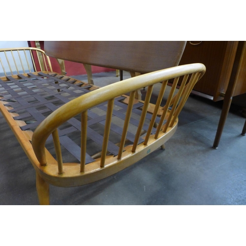 166 - An Ercol Blonde model 355 elm and beech studio couch/daybed