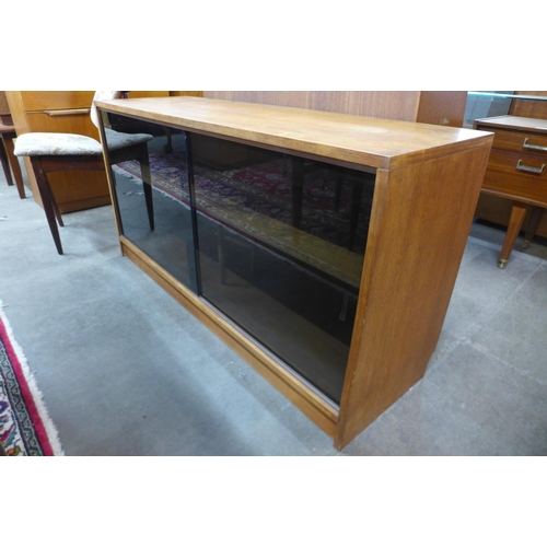 175 - Two teak bookcases