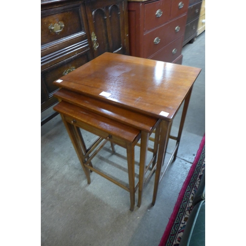 219 - An Edward VII mahogany nest of table