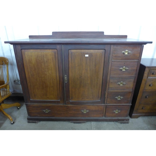 227 - A George III mahogany fitted press cupboard