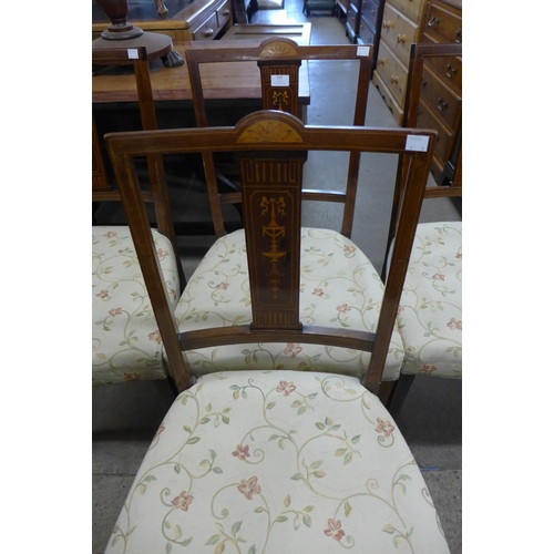 237 - A set of four Edward VII inlaid mahogany chairs