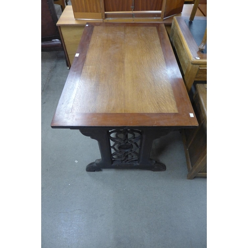 239 - A Victorian Gothic Revival oak library table (later top), 72cms h ,116cms w, 69cms d