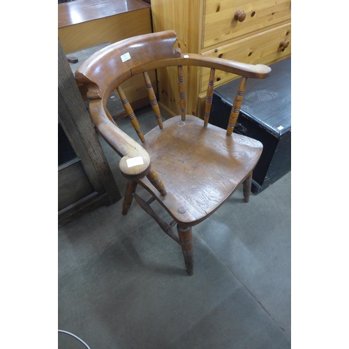 292 - A Victorian elm and beech smokers bow chair