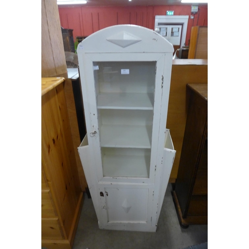 295 - An Art Deco painted bookcase