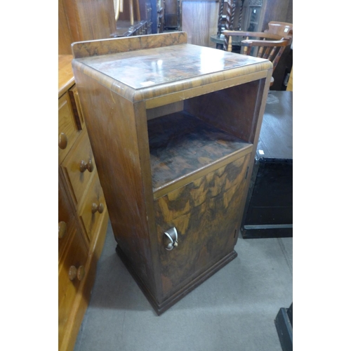 297 - An Art Deco walnut pot cupboard