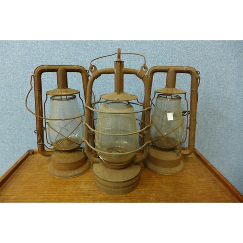 397 - Three Tilley lamps