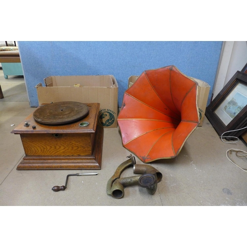 399 - An gramophone with red metal horn speaker and a collection of records