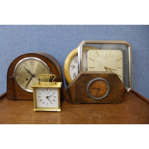 441 - A collection of clocks, barometers and a cased thermometer