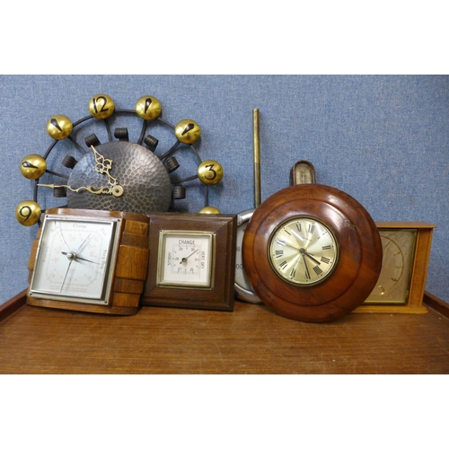 441 - A collection of clocks, barometers and a cased thermometer