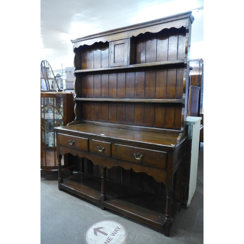 66 - A George III style oak dresser