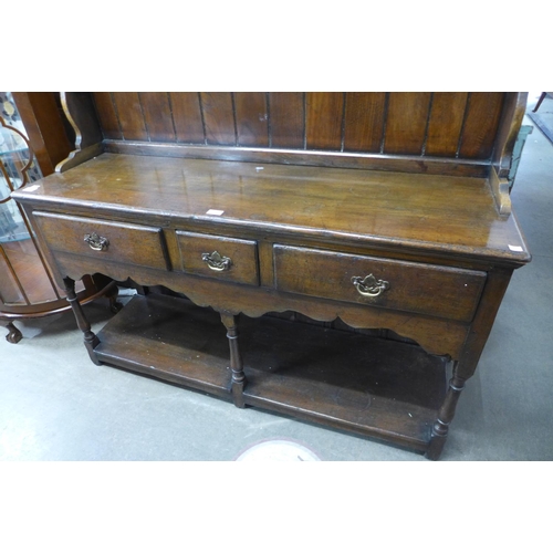 66 - A George III style oak dresser