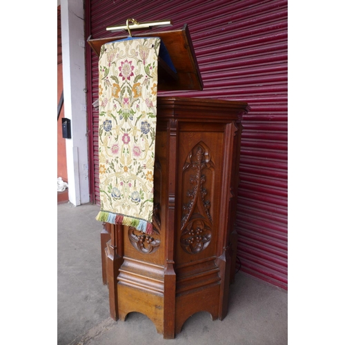 70 - A Victorian Gothic Revival carved oak church pulpit, 186cms h, 116cms w.