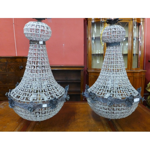 80 - A pair of French Empire style white metal and glass chandeliers, 75cms h