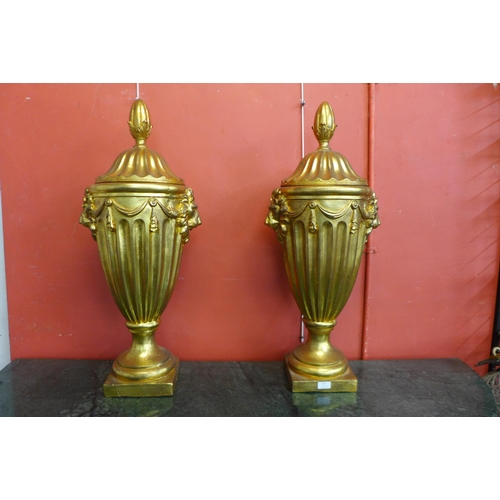 81 - A pair of large George III style gilt urns and covers, 88cms h (20038898)   #