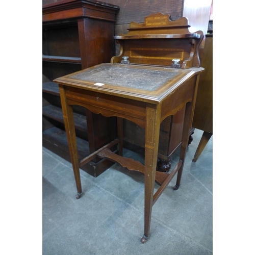 85 - An Edward VII inlaid mahogany Davenport top desk