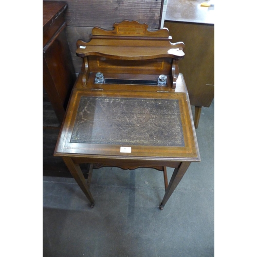 85 - An Edward VII inlaid mahogany Davenport top desk