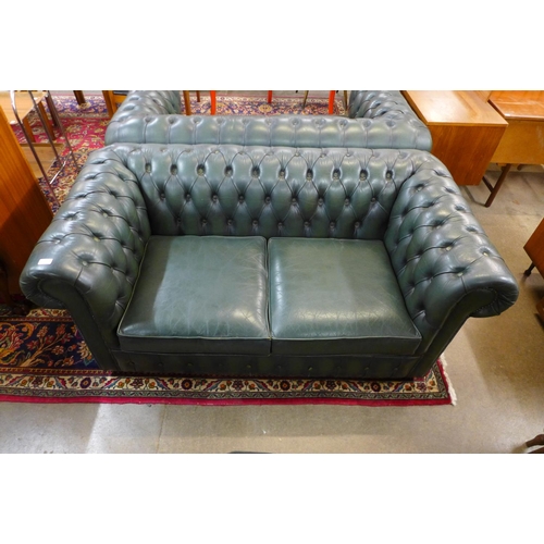 89 - A green leather Chesterfield settee