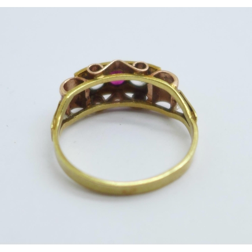 1029 - A 14ct gold, red and white three stone ring, 3g, M, marked 585