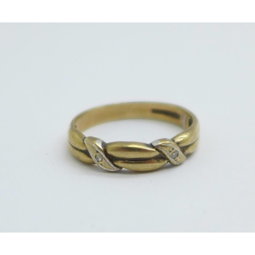 1034 - A 9ct gold and diamond ring, 2.4g, P