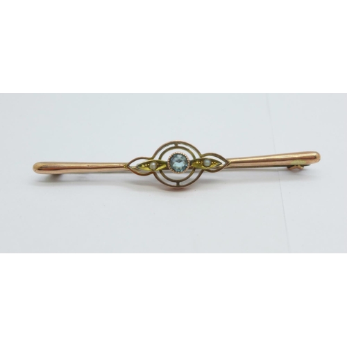 1042 - A 9ct gold, pearl and blue stone brooch, 2.4g