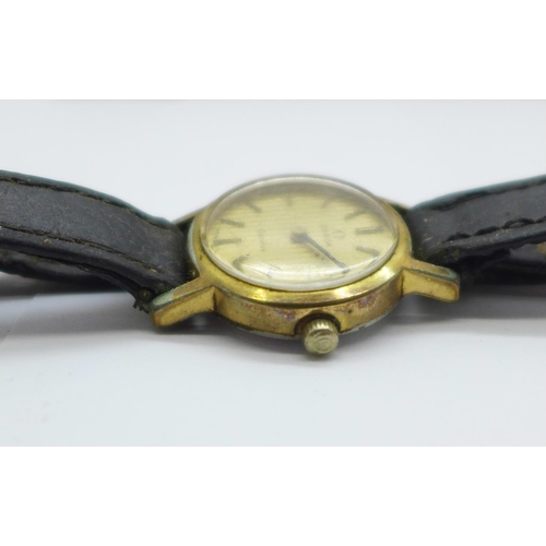 1043 - A lady's Omega wristwatch, with case