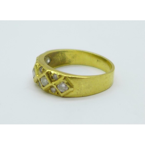 1056 - An 18ct gold and diamond ring, 4.1g, N