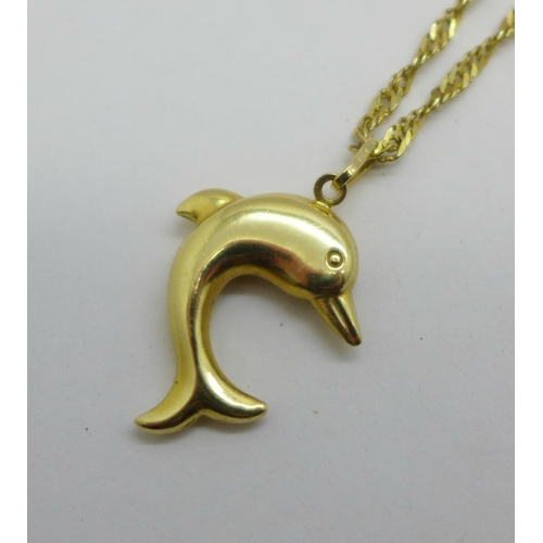 1078 - A 14ct gold dolphin pendant and chain, 5.5g