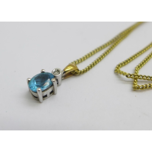 1080 - A 9ct gold, topaz and diamond accent pendant with chain