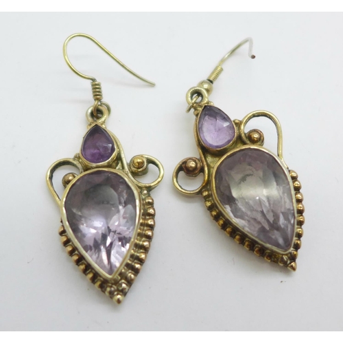 1082 - A pair of silver gilt and amethyst earrings