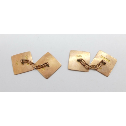 1085 - A pair of 9ct gold cufflinks, 2.7g