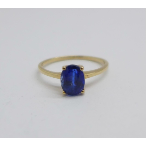 1087 - A 9ct gold and synthetic sapphire solitaire ring, 1.9g, Q