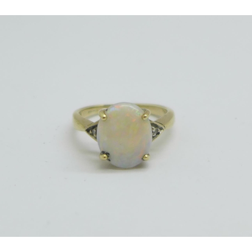 1090 - A 9ct gold and opal ring with diamond shoulders, 2.4g, L