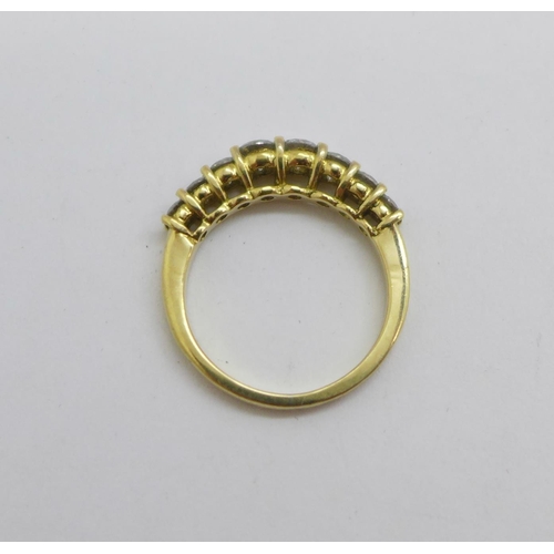 1091 - An 18ct gold, eight stone graduated diamond ring, approximately 1.1carat diamond weight, 4.2g, N