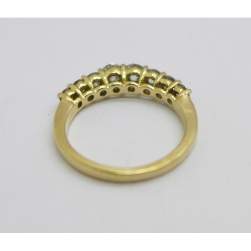 1091 - An 18ct gold, eight stone graduated diamond ring, approximately 1.1carat diamond weight, 4.2g, N