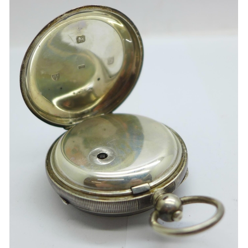 1097 - A silver pocket watch, lacking hour hand