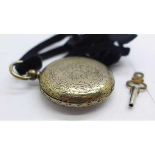 1104 - A silver fob watch, dial a/f, 4cm