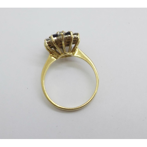 1118 - A 9ct gold, sapphire and white gem cluster ring, 3.4g, P