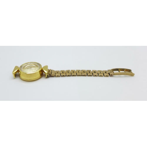 1124 - A lady's 18ct gold cased wristwatch, case 6.4g without movement, and one half of a 9ct gold bracelet... 